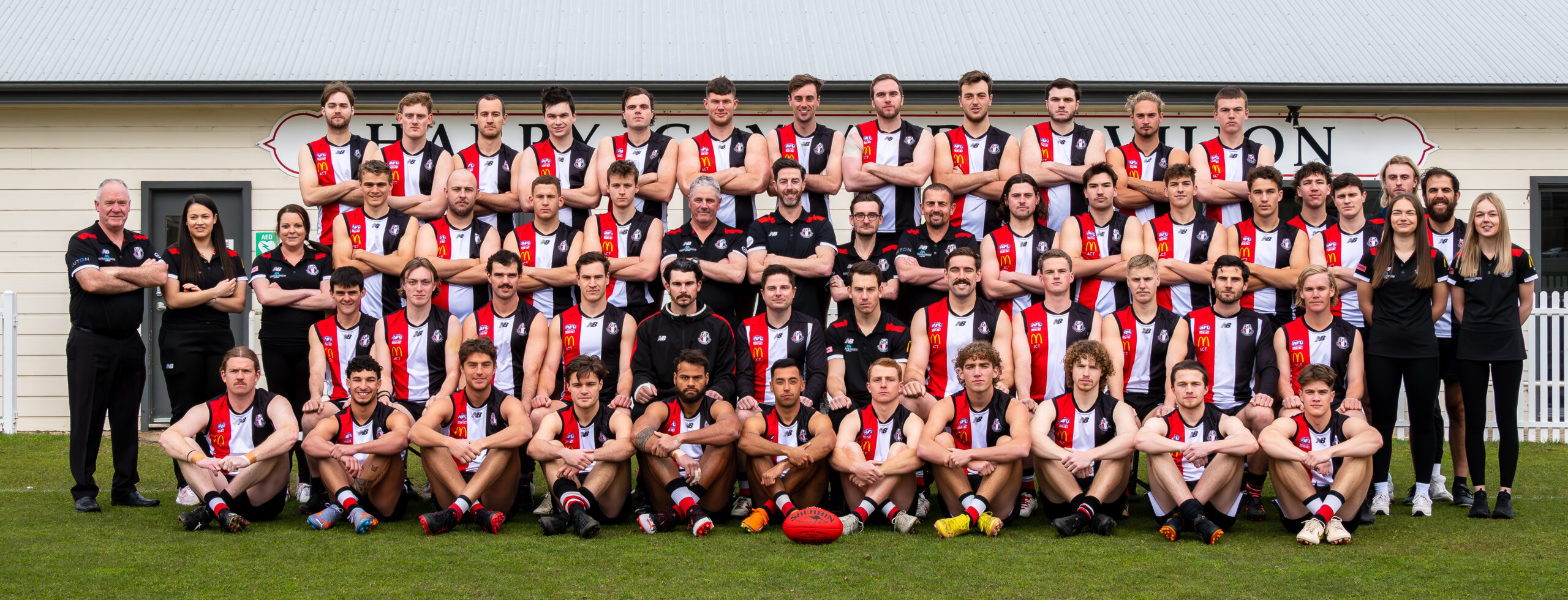 2023 AFC M1s2s 3 Men's first and second grade players and staff lined up for a team photo